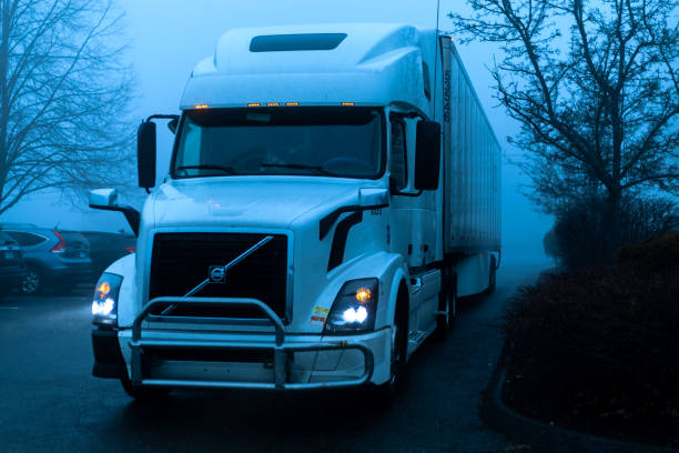 HOME west unity, ohio, usa 01.01.2023: volvo semi truck on fog weather